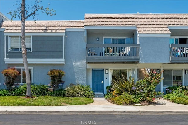 10 Eastmont, Irvine, CA 92604 - townhome / multi-family property featuring a balcony and stucco siding