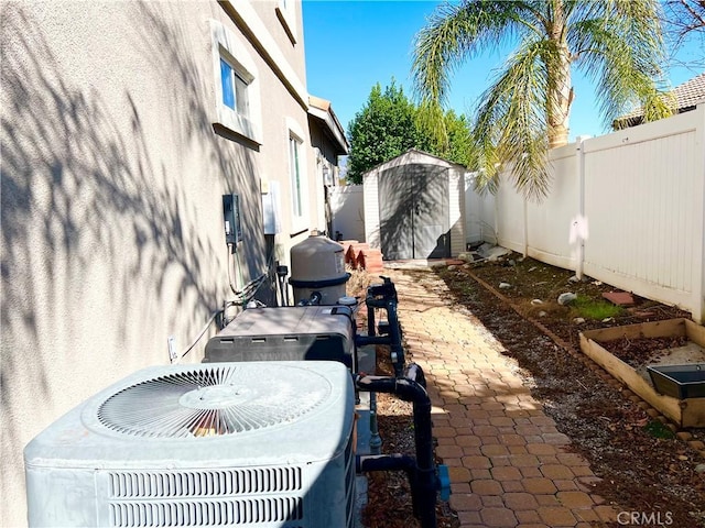 1539 Carmel Ct, Redlands, CA 92374 - fenced backyard featuring a shed and a patio area