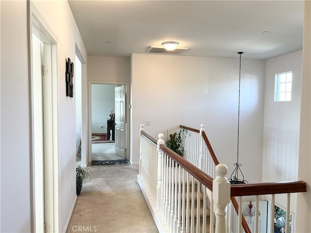 1539 Carmel Ct, Redlands, CA 92374 - hall featuring an upstairs landing and light carpet
