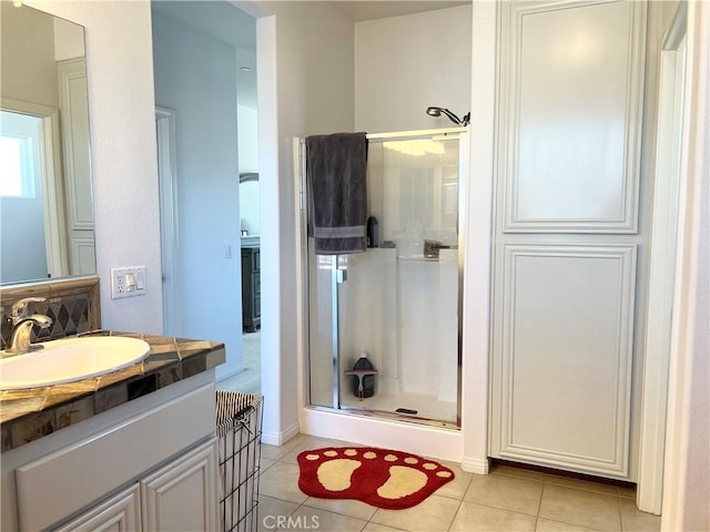 1539 Carmel Ct, Redlands, CA 92374 - bathroom with a stall shower, vanity, and tile patterned floors