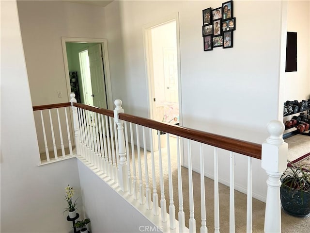 1539 Carmel Ct, Redlands, CA 92374 - hallway featuring an upstairs landing and carpet flooring