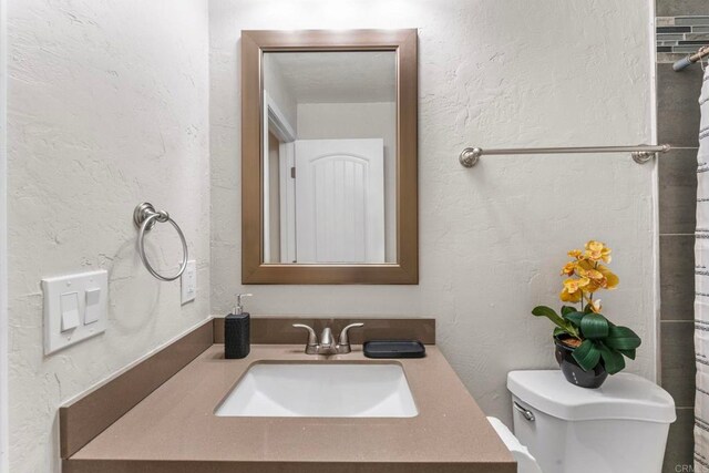 4117 Jamul Ave, San Diego, CA 92113 - bathroom featuring vanity and a textured wall