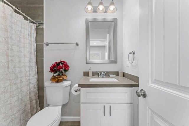 4117 Jamul Ave, San Diego, CA 92113 - bathroom featuring vanity and a shower with shower curtain
