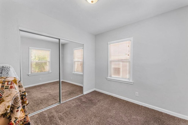 4117 Jamul Ave, San Diego, CA 92113 - carpeted bedroom featuring a closet and baseboards