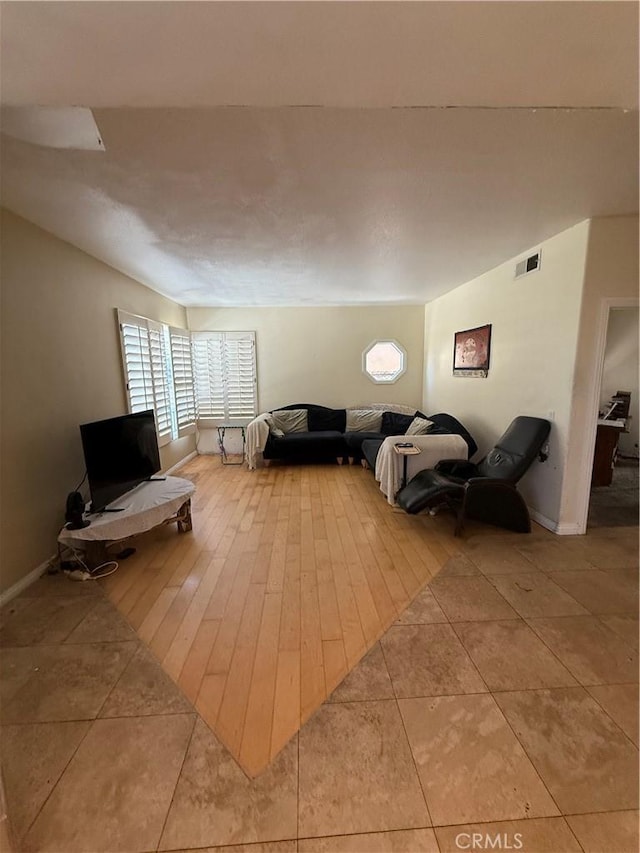 22241 Birchleaf, Mission Viejo, CA 92692 - living room featuring light tile patterned floors