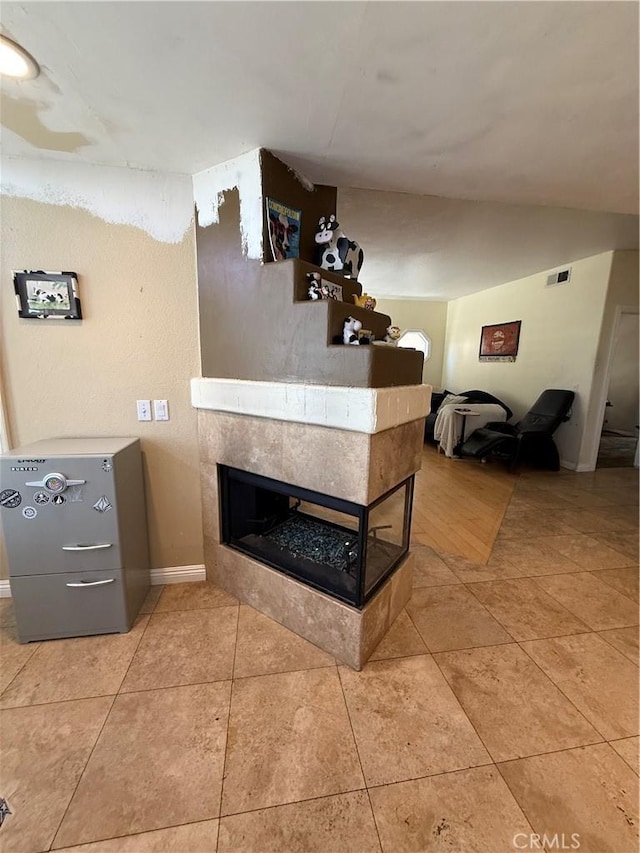 22241 Birchleaf, Mission Viejo, CA 92692 - detailed view of baseboards and a fireplace