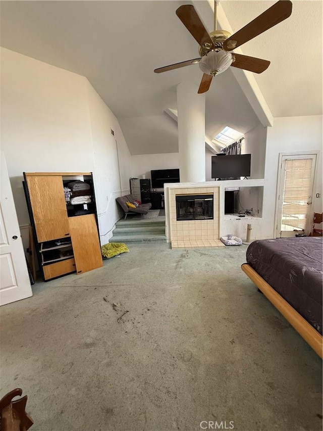 22241 Birchleaf, Mission Viejo, CA 92692 - carpeted bedroom with lofted ceiling, a tile fireplace, and a ceiling fan