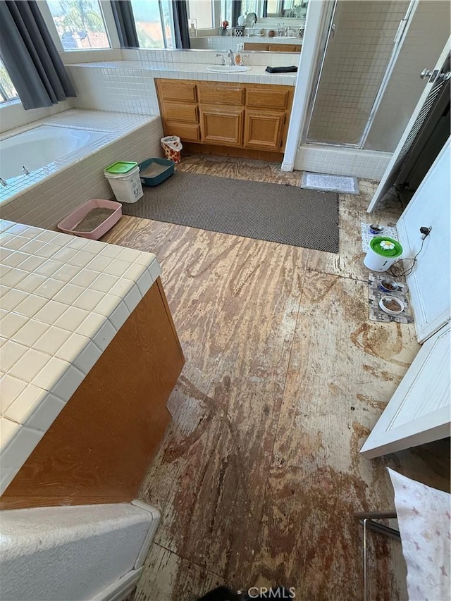 22241 Birchleaf, Mission Viejo, CA 92692 - bathroom with vanity, a bath, and a shower stall