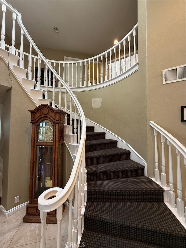 22241 Birchleaf, Mission Viejo, CA 92692 - stairway featuring tile patterned floors and a high ceiling