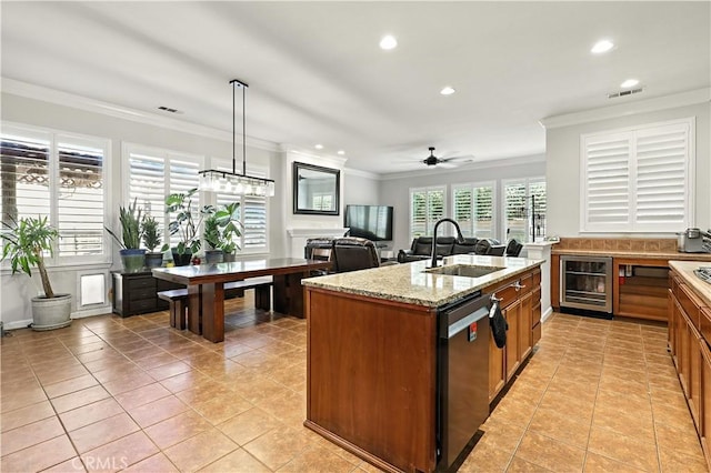 17024 Granite Falls Way, Chowchilla, CA 93610 - kitchen featuring beverage cooler, stainless steel dishwasher, crown molding, recessed lighting, and brown cabinets