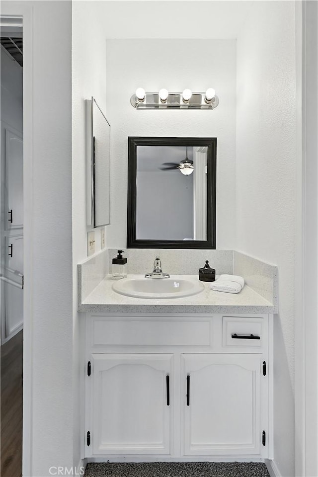 3537 Trinity Ct, Merced, CA 95340 - bathroom featuring vanity and ceiling fan