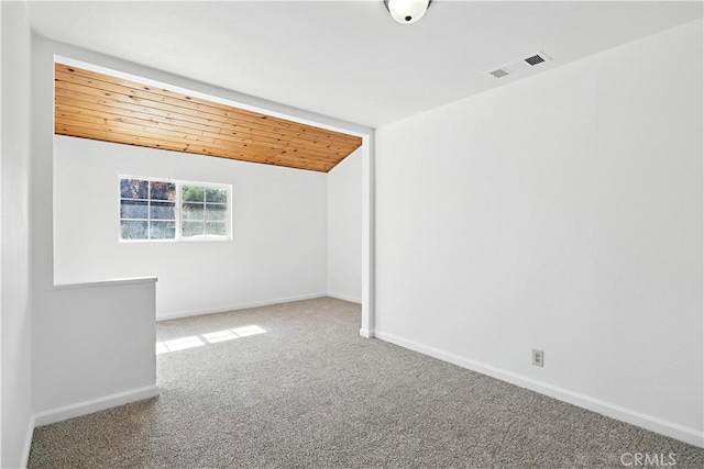 3537 Trinity Ct, Merced, CA 95340 - carpeted spare room featuring wooden ceiling and baseboards