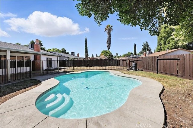 3537 Trinity Ct, Merced, CA 95340 - view of swimming pool featuring a fenced backyard