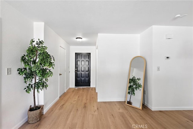 3537 Trinity Ct, Merced, CA 95340 - entrance foyer featuring light wood-style floors and baseboards
