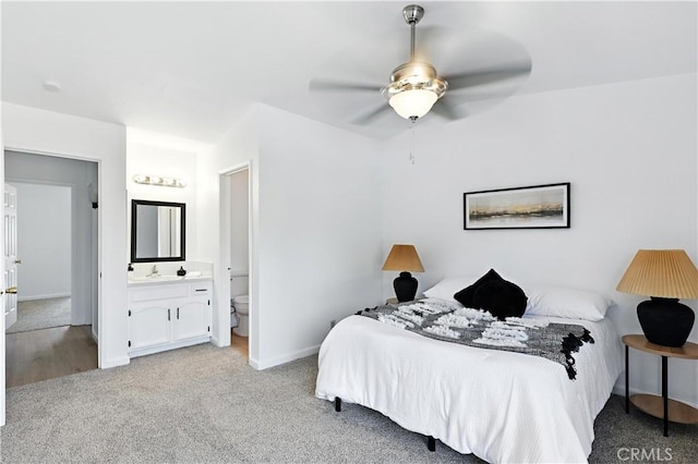 3537 Trinity Ct, Merced, CA 95340 - carpeted bedroom featuring ensuite bath and ceiling fan