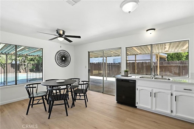 3537 Trinity Ct, Merced, CA 95340 - dining area featuring light wood finished floors and ceiling fan