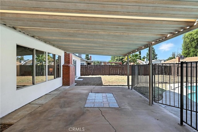 3537 Trinity Ct, Merced, CA 95340 - fenced backyard with a patio area