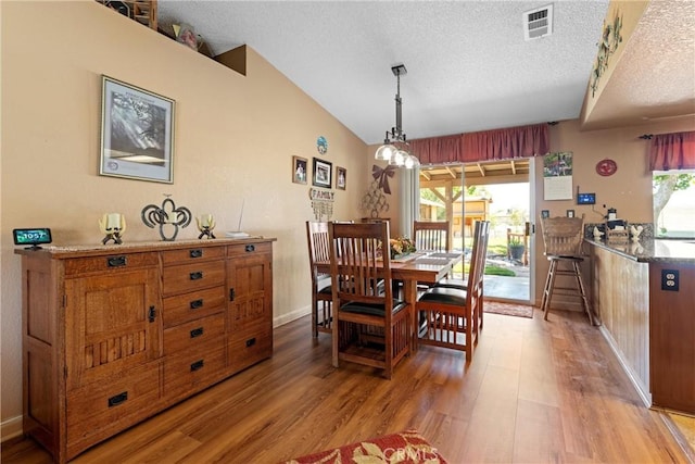 36916 95th St E, Littlerock, CA 93543 - dining area with healthy amount of natural light, light wood finished floors, and a textured ceiling
