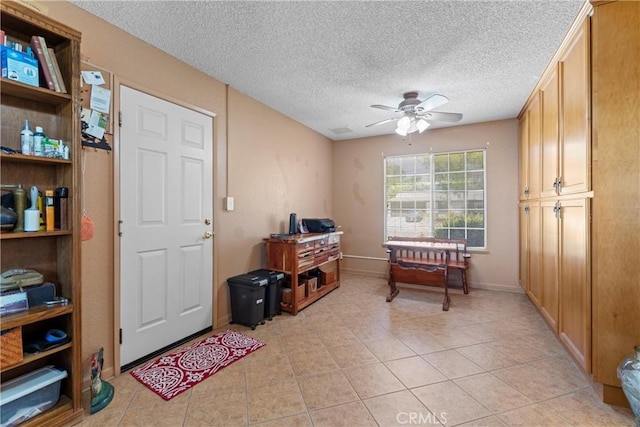 36916 95th St E, Littlerock, CA 93543 - entrance foyer featuring a ceiling fan, light tile patterned floors, and a textured ceiling