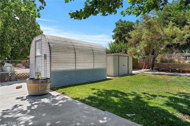 36916 95th St E, Littlerock, CA 93543 - view of yard with a storage unit and a patio