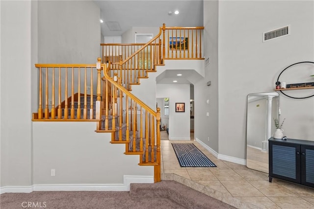 27318 Chesterfield Dr, Valencia, CA 91354 - stairway featuring a towering ceiling and tile patterned floors