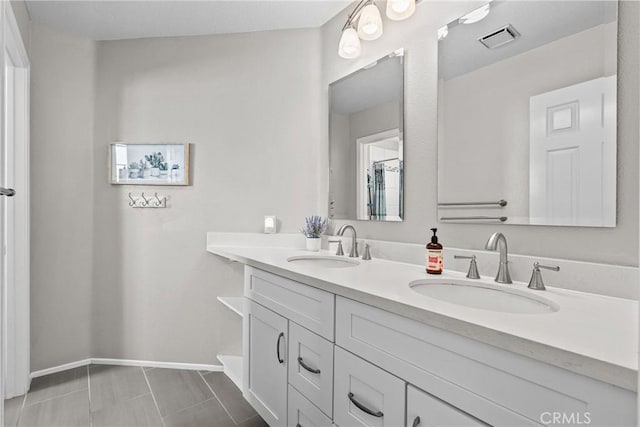 27318 Chesterfield Dr, Valencia, CA 91354 - bathroom with double vanity and tile patterned flooring