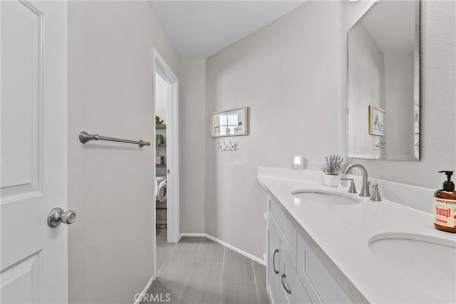 27318 Chesterfield Dr, Valencia, CA 91354 - bathroom with double vanity and baseboards