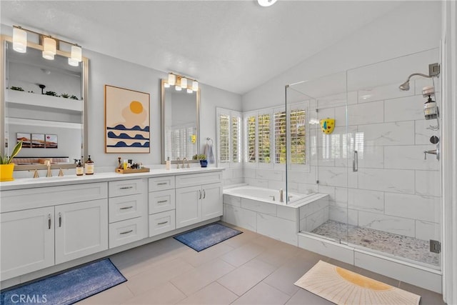 27318 Chesterfield Dr, Valencia, CA 91354 - bathroom featuring double vanity, a bath, a stall shower, lofted ceiling, and tile patterned flooring