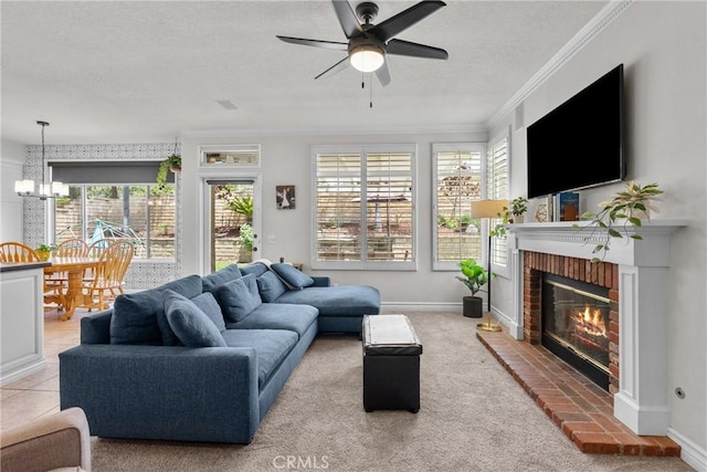 27318 Chesterfield Dr, Valencia, CA 91354 - living area with a brick fireplace, a textured ceiling, a chandelier, crown molding, and a ceiling fan