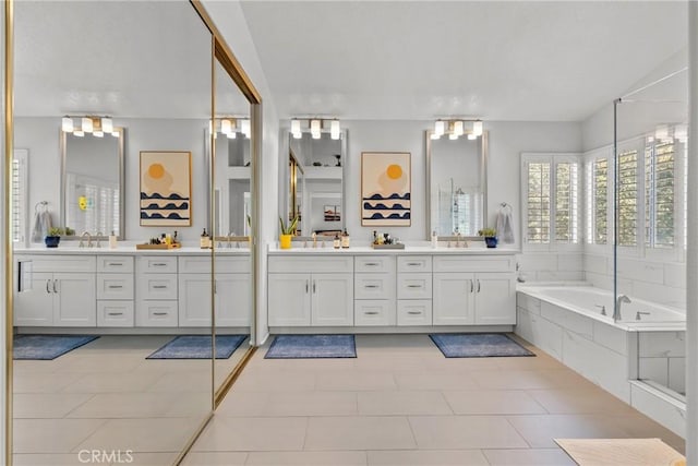 27318 Chesterfield Dr, Valencia, CA 91354 - full bathroom featuring vanity, a garden tub, and tile patterned floors
