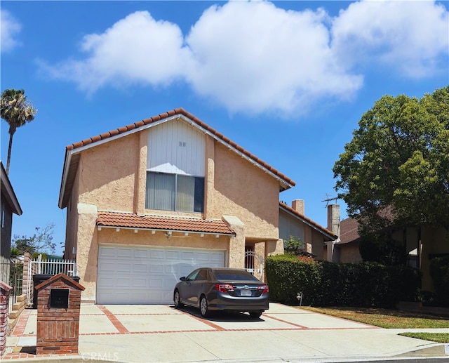 7952 Laramie, Winnetka, CA 91306 - view of front of home with a tiled roof, an attached garage, concrete driveway, and stucco siding