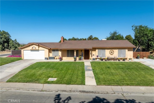 36807 95th St E, Littlerock, CA 93543 - single story home with stucco siding, a garage, driveway, a chimney, and a porch