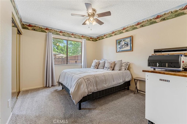 36807 95th St E, Littlerock, CA 93543 - bedroom featuring carpet, a textured ceiling, and a ceiling fan