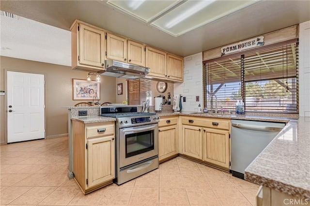 36807 95th St E, Littlerock, CA 93543 - kitchen featuring appliances with stainless steel finishes, under cabinet range hood, a peninsula, light tile patterned floors, and light brown cabinetry