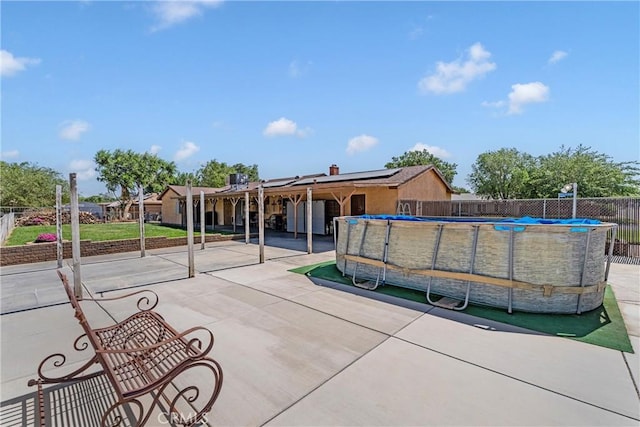 36807 95th St E, Littlerock, CA 93543 - view of community with a fenced backyard, a pool, and a patio