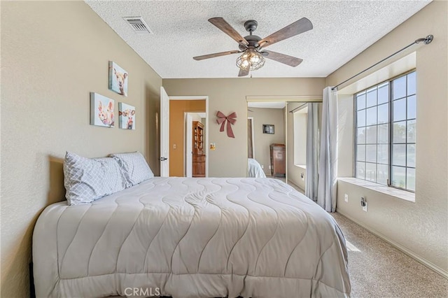 36807 95th St E, Littlerock, CA 93543 - carpeted bedroom with ceiling fan, a textured ceiling, and a closet