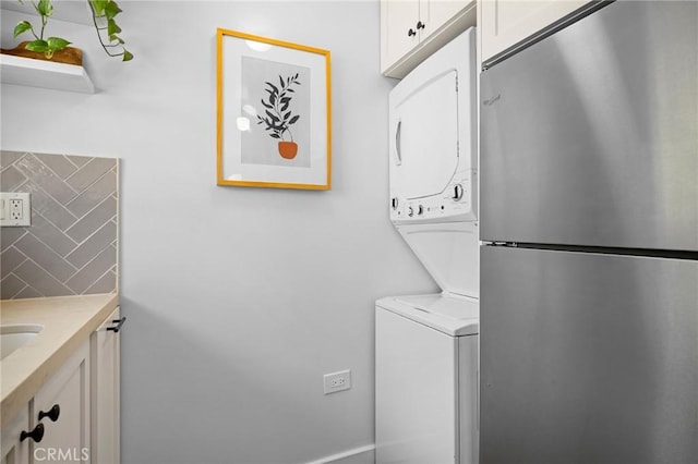 537 E Maple St Unit 3, Glendale, CA 91205 - washroom with stacked washing machine and dryer and cabinet space