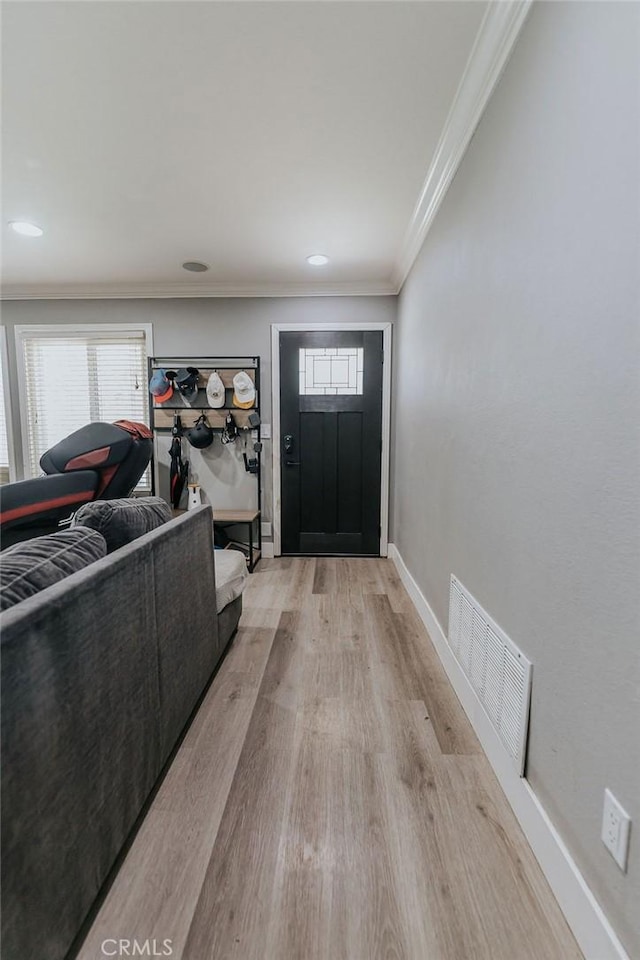 2438 Emerson Cir, Corona, CA 92882 - entrance foyer featuring light wood-style floors, crown molding, and recessed lighting