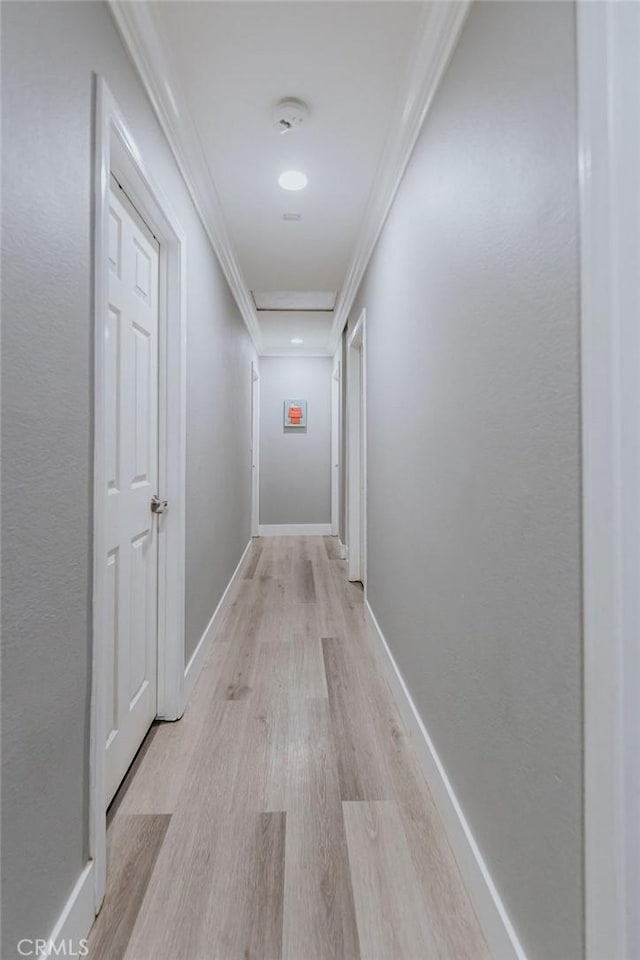 2438 Emerson Cir, Corona, CA 92882 - hall with light wood-type flooring and crown molding