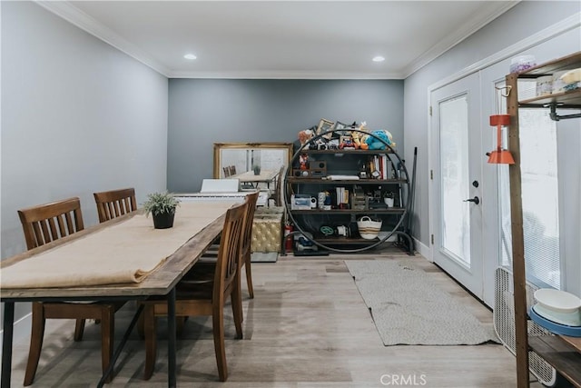 2438 Emerson Cir, Corona, CA 92882 - dining space featuring french doors, wood finished floors, crown molding, and recessed lighting