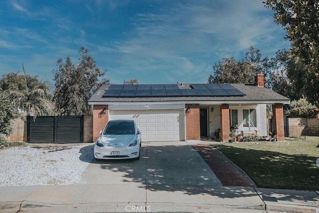 2438 Emerson Cir, Corona, CA 92882 - ranch-style house featuring brick siding, concrete driveway, a garage, solar panels, and a chimney
