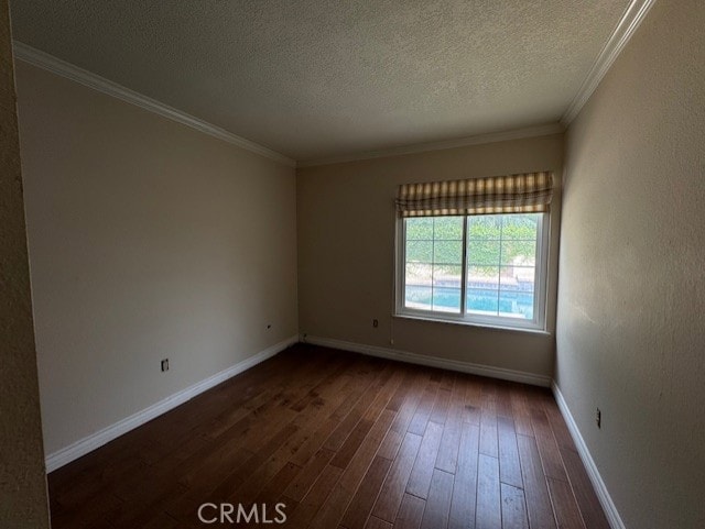 8641 Limestone Dr, Riverside, CA 92504 - unfurnished room featuring a textured ceiling, dark wood-style flooring, and crown molding