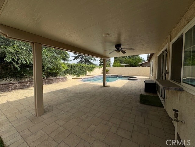 8641 Limestone Dr, Riverside, CA 92504 - fenced backyard featuring a patio and ceiling fan