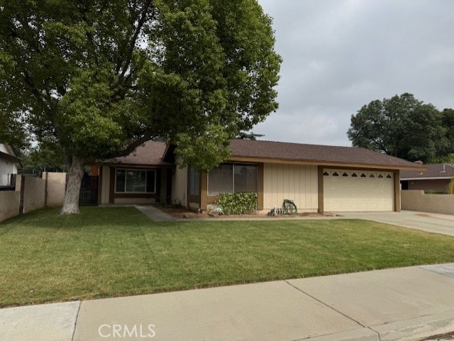 8641 Limestone Dr, Riverside, CA 92504 - ranch-style home with an attached garage and concrete driveway