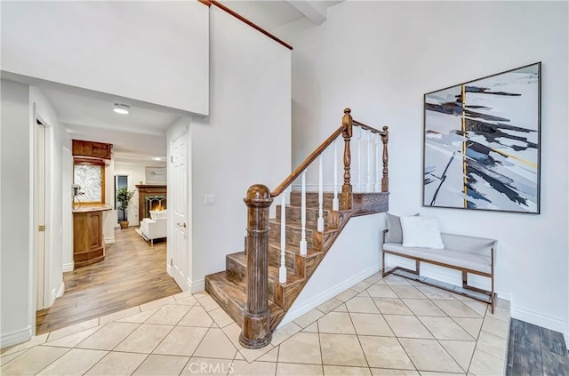 23216 Park Esperanza, Calabasas, CA 91302 - staircase with a high ceiling and tile patterned floors