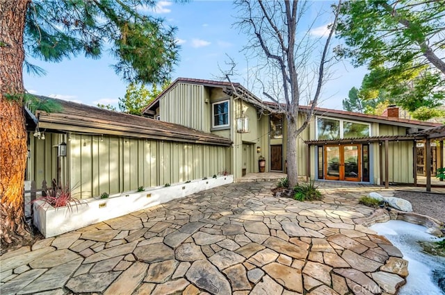 23216 Park Esperanza, Calabasas, CA 91302 - back of property with a patio area and board and batten siding