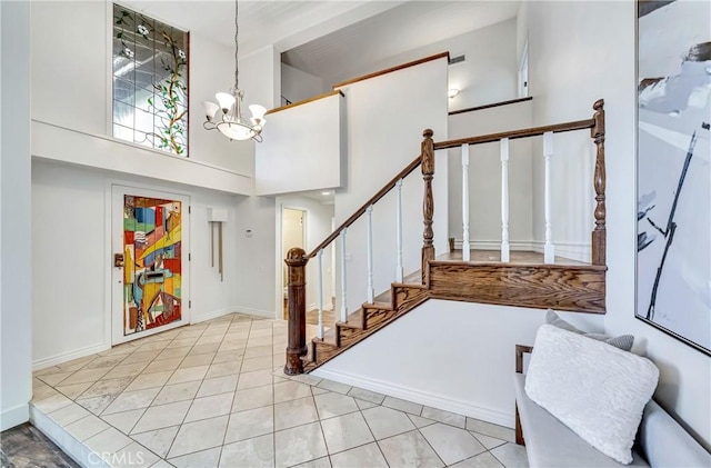 23216 Park Esperanza, Calabasas, CA 91302 - entrance foyer featuring a chandelier, a towering ceiling, stairway, and light tile patterned flooring