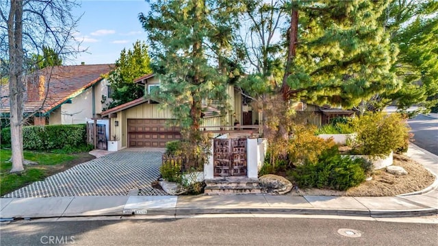 23216 Park Esperanza, Calabasas, CA 91302 - view of front of house featuring a garage and driveway