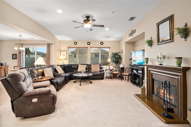 42432 72nd St W, Lancaster, CA 93536 - living area with a glass covered fireplace, a ceiling fan, carpet floors, a chandelier, and recessed lighting