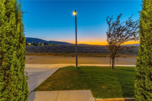 42432 72nd St W, Lancaster, CA 93536 - view of grassy yard with a mountain view